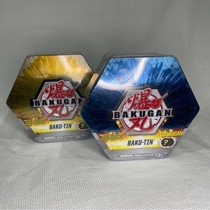 Bakugan Battle Planet Baku-Tin Blue And Gold Lot of 2 Tins, Sealed.